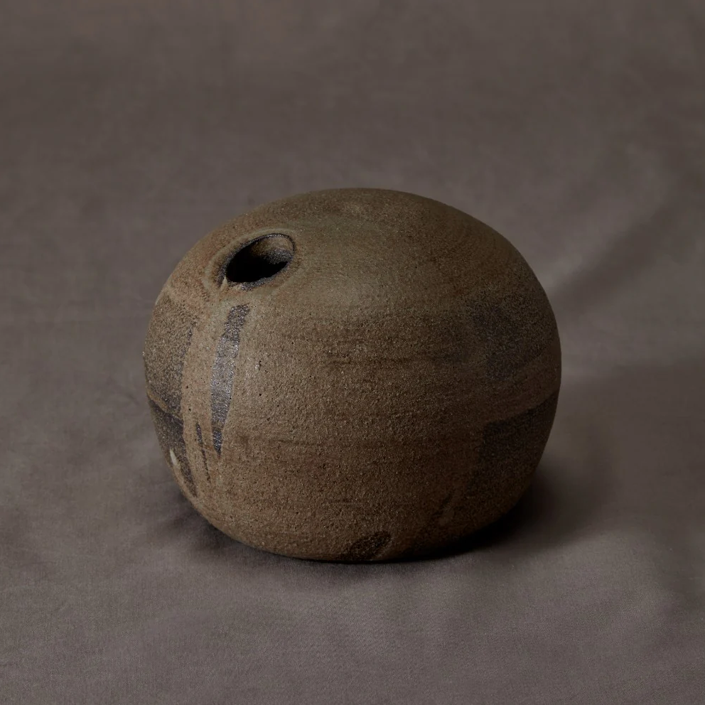 handmade aura vase in earth medium